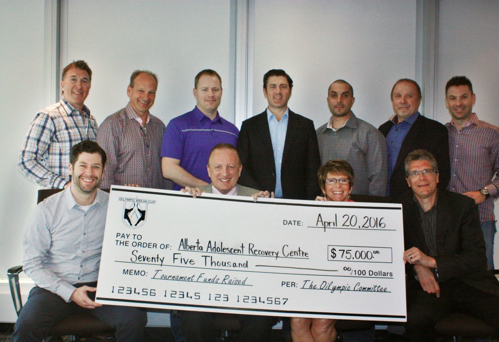 Cheque Presentation from Oilympics Hockey Tournament